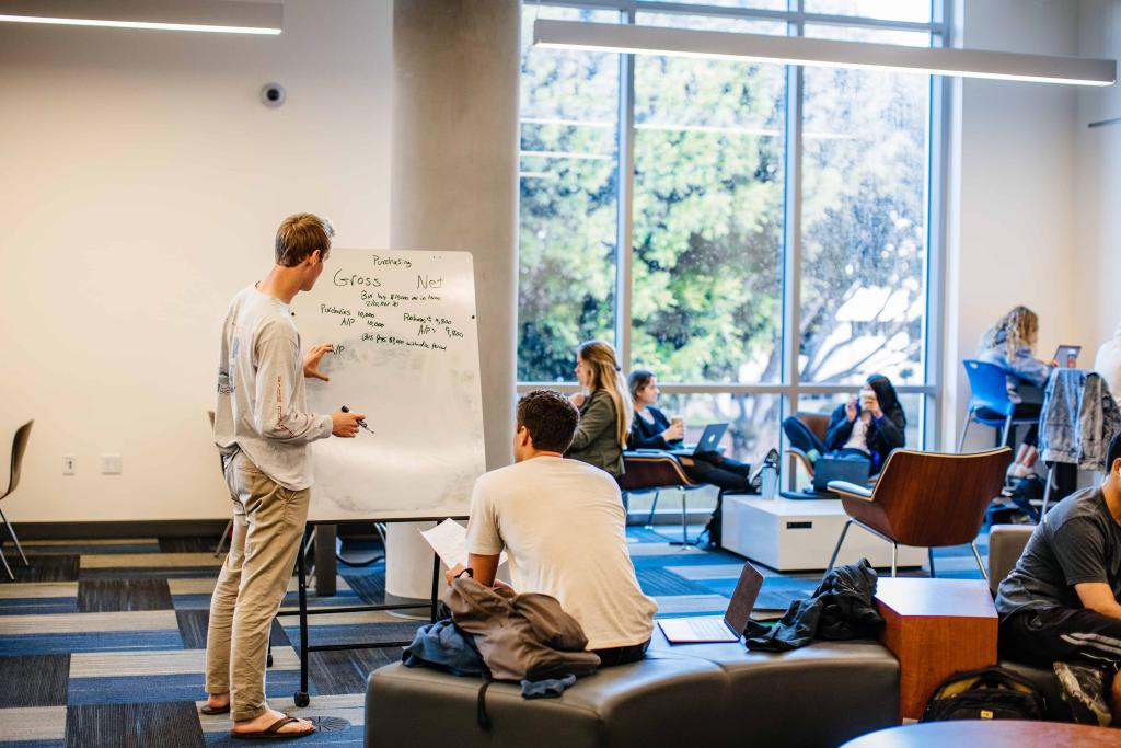 Students doing a presentation at UCSB library