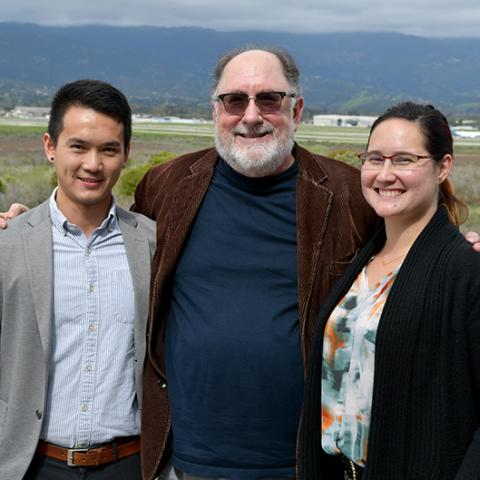 2023 Grad Slam Prelim Round 10 winner Chongzheng Wei, GGSE Dean Jeffrey Milem, and Round 10 runner up Alexandria Muller