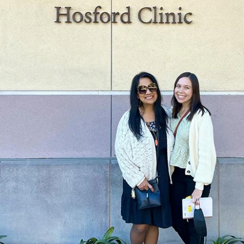 Elizabeth Cortez and Juliana Ison outside the Hosford Clinic