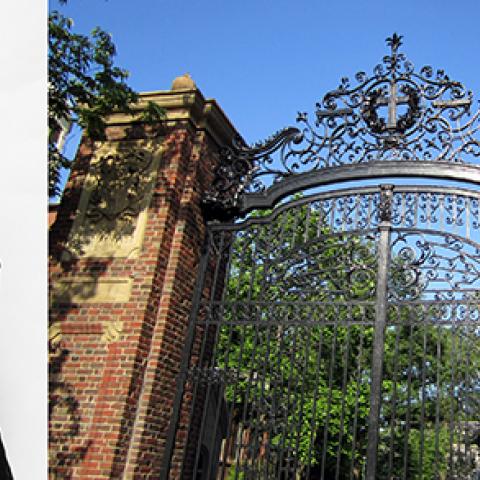 Dean Jewffrey Milem with a photo of Harvard Gate, as he was a guest lecturer for the school