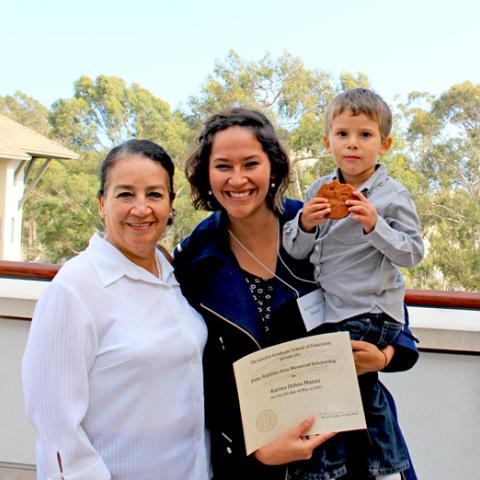 Karina Ochoa Manzo with her mother and son