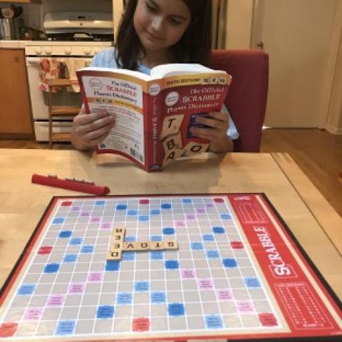 Lila Kia-Keating playing Scrabble