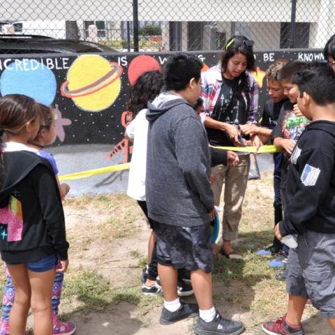 Ribbon cutting at Isla Vista mural