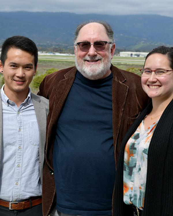 2023 Grad Slam Prelim Round 10 winner Chongzheng Wei, GGSE Dean Jeffrey Milem, and Round 10 runner up Alexandria Muller