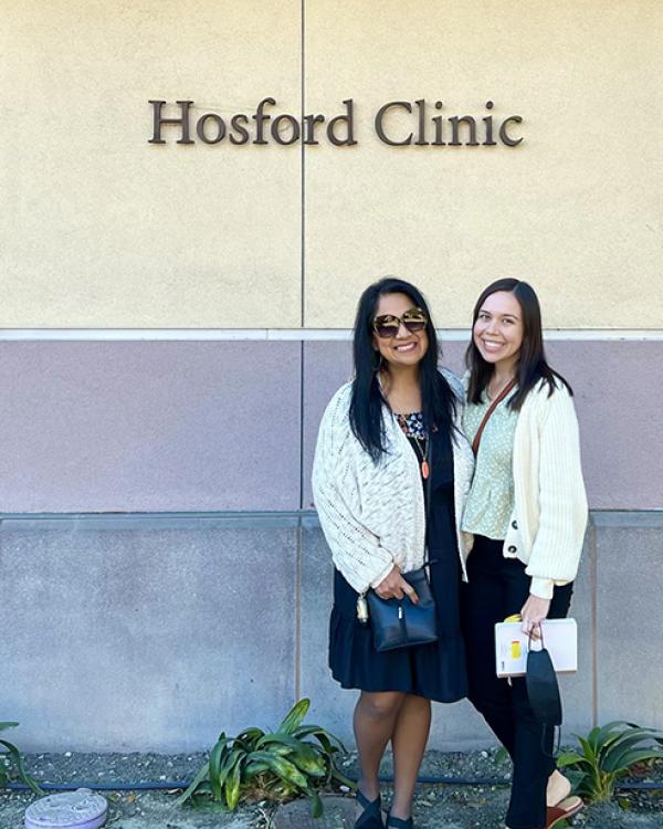 Elizabeth Cortez and Juliana Ison outside the Hosford Clinic 