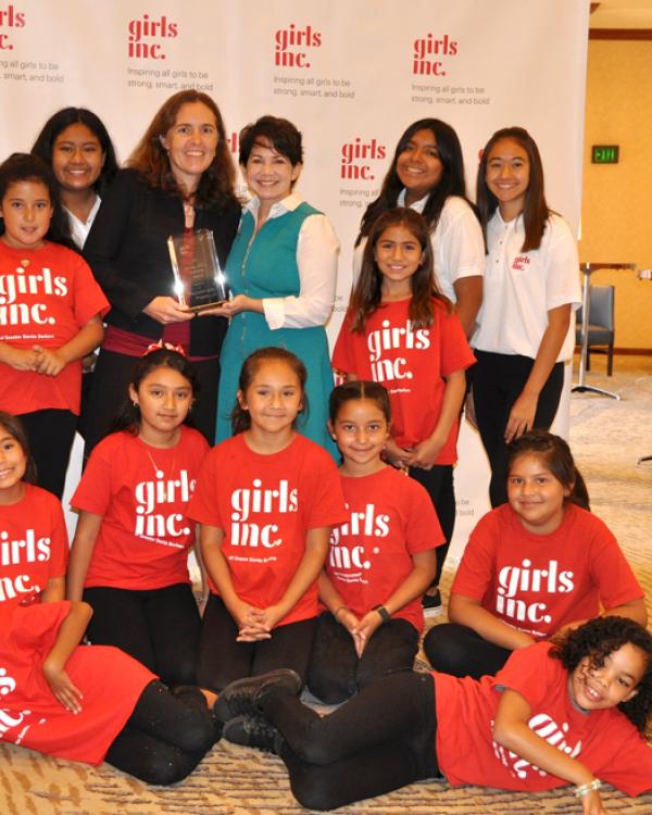 Danielle Harlow and Diana Arya with Girls Inc. girls 