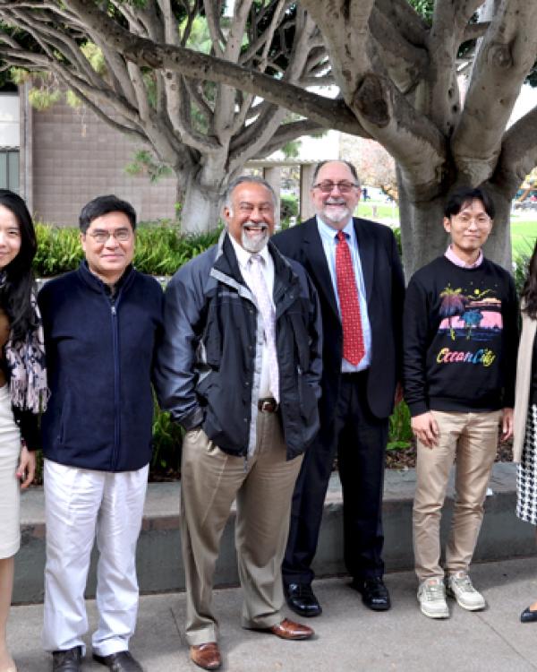 Dean Milem with Britt Ortiz of EAOP and the Seoul National University visitors 
